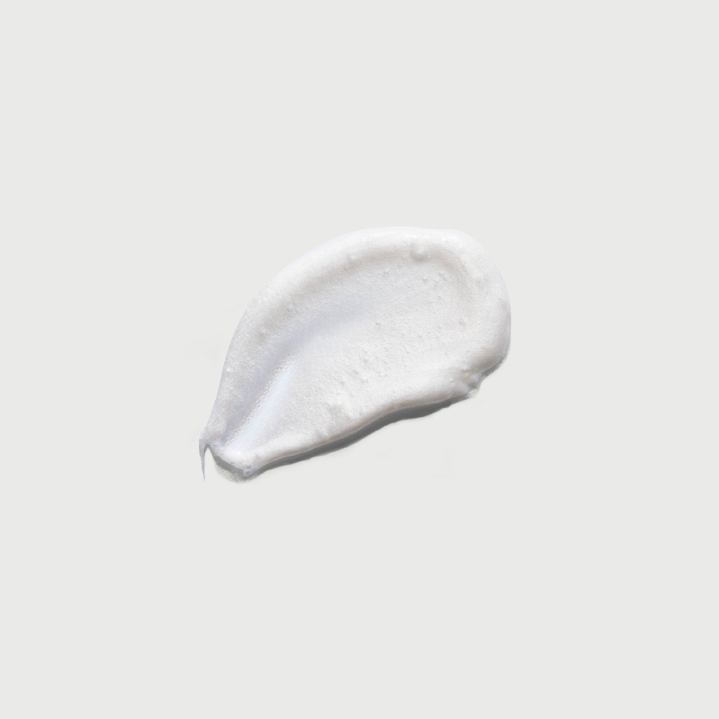 the-smoother-glycolic-acid-exfoliating-body-wash-j0 NATR-40002-Swatch-The-Smoother-Glycolic-Acid-Exfoliating-Body-Wash-bonebkgd.jpg