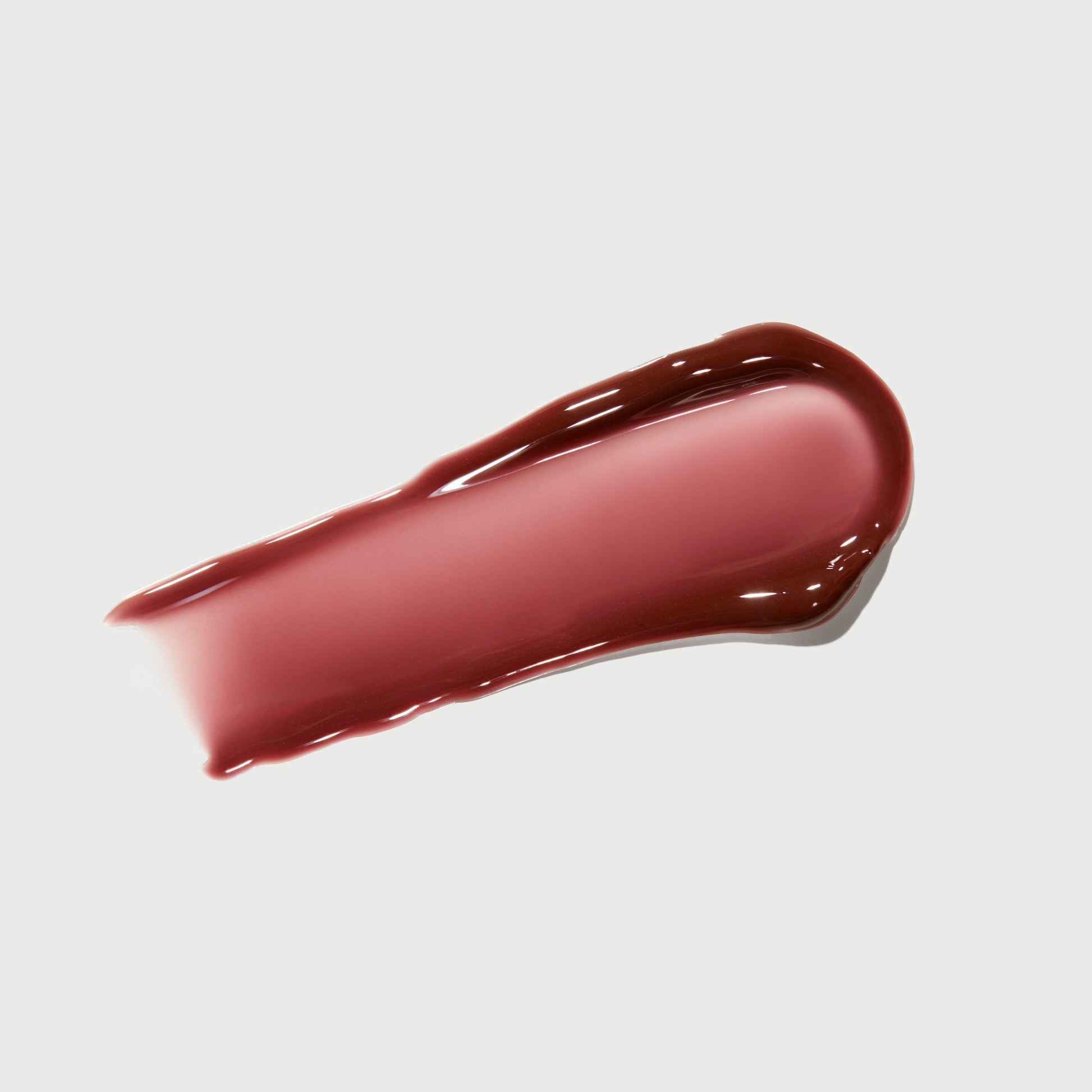 phyto-glow-lip-balm-crimson-w0 NATR-10122-Swatch-Phyto-Glow-Crimson-bonebkgd.jpg