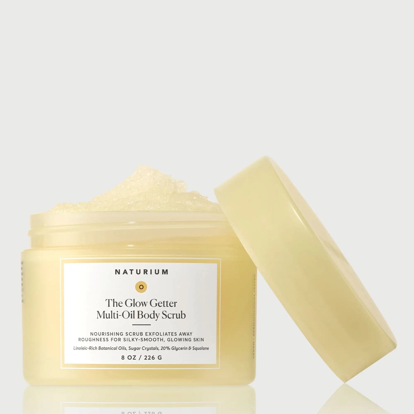 the-glow-getter-multi-oil-body-scrub-q4 NATR-40028-GlowGetter-Multi-Oil-Body-Scrub-Front-CapOff-bonebkgd.webp