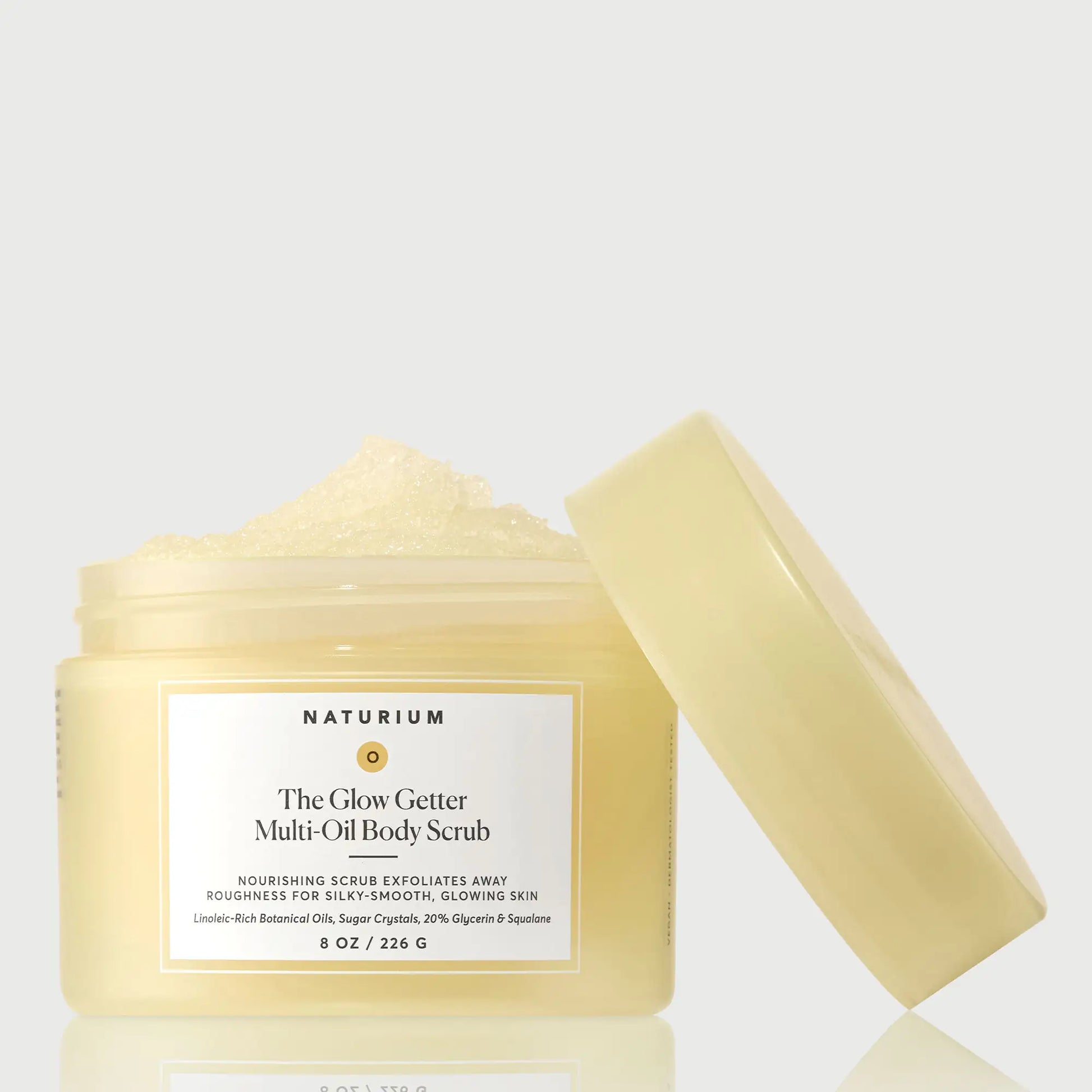 the-glow-getter-multi-oil-body-scrub-q4 NATR-40028-GlowGetter-Multi-Oil-Body-Scrub-Front-CapOff-bonebkgd.webp