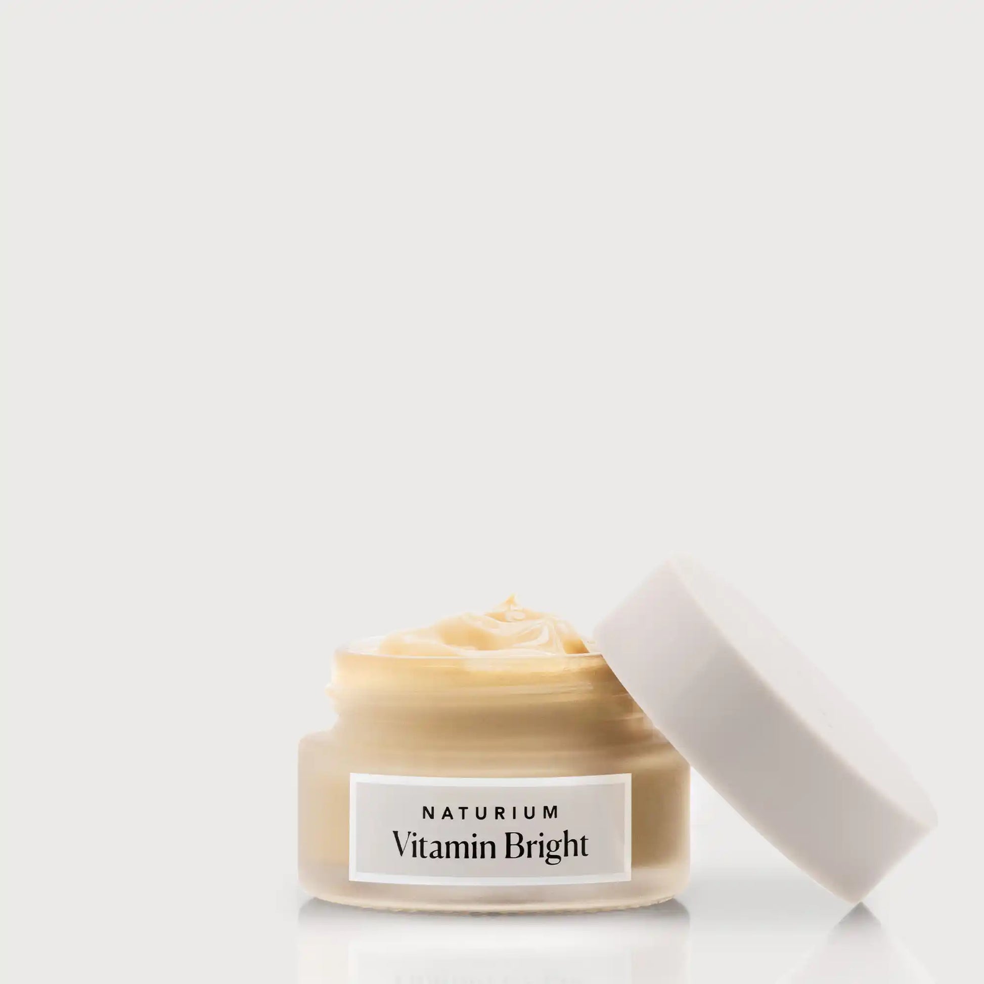 vitamin-bright-illuminating-eye-cream-i0 NATR-VitaminBright_LIGHT_Primary_front_openjar_bone.webp