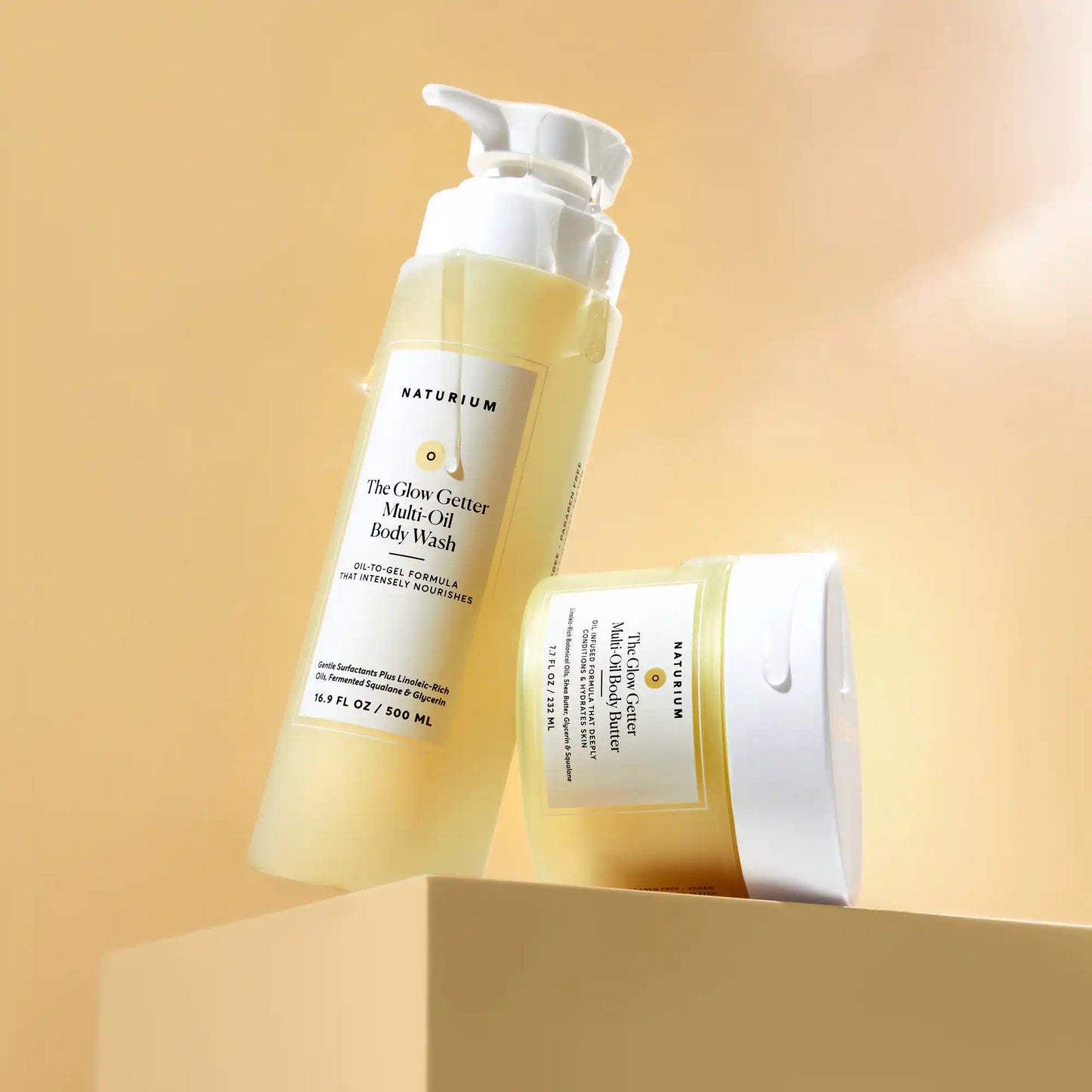 the-glow-all-out-body-bundle-r7 gg-bodybutter_1464-crop_revcolor_FL.webp